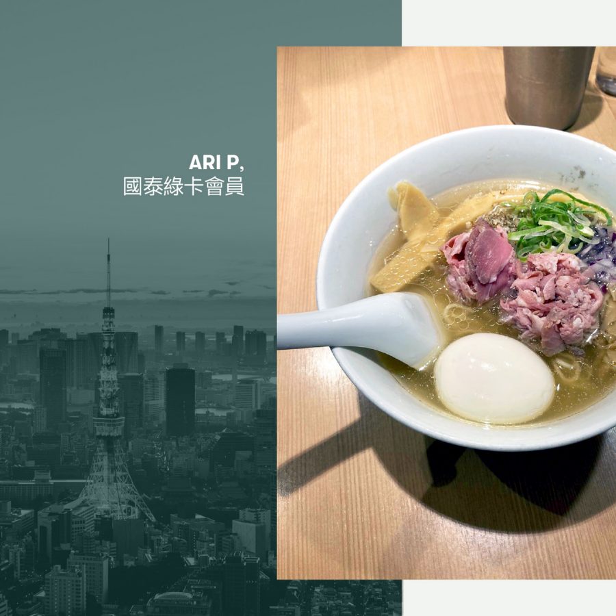 A bowl of ramen on a wooden table.